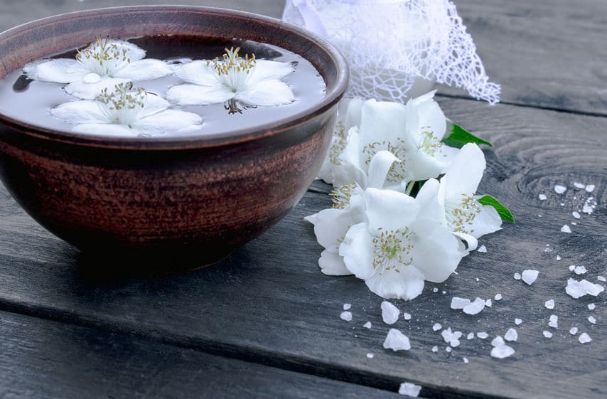 Jasmine flowers float on water. Relaxation concept