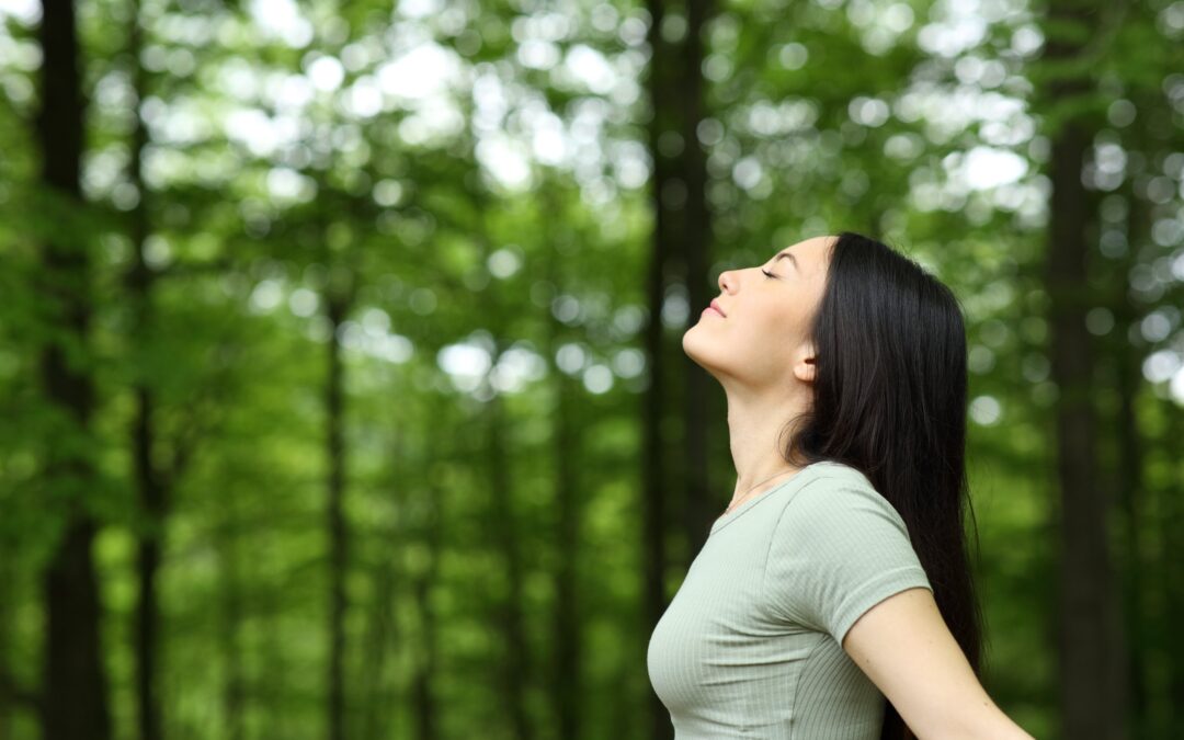 Woman Breathing Nature - Qigong Breathing Blog Post - Qigong Awareness