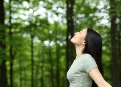 Woman Breathing Nature - Qigong Breathing Blog Post - Qigong Awareness
