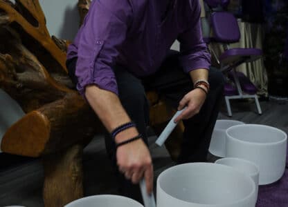 Jon Demel pictured demonstrating singing bowls. Student shares after completing Live Workshop with Qigong Awareness, LLC
