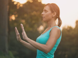 woman practicing qigong meditation